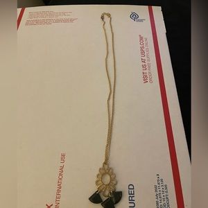 Gold color custom necklace with black accents